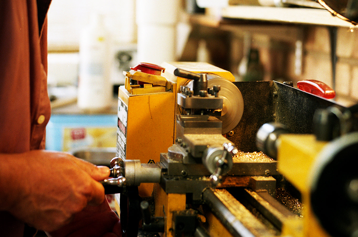 Noble and Graff engineer working on lathe